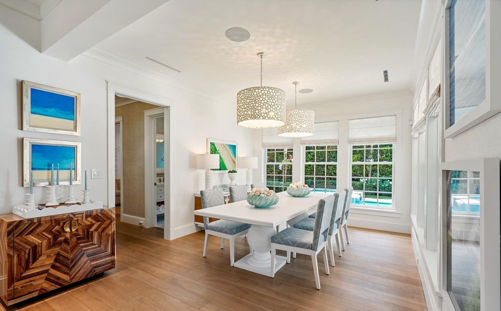 Indulge in luxurious coastal living at 156 Seagate, a meticulously designed haven nestled on Palm Beach Island's coveted North End.