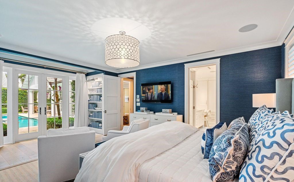 Indulge in luxurious coastal living at 156 Seagate, a meticulously designed haven nestled on Palm Beach Island's coveted North End.