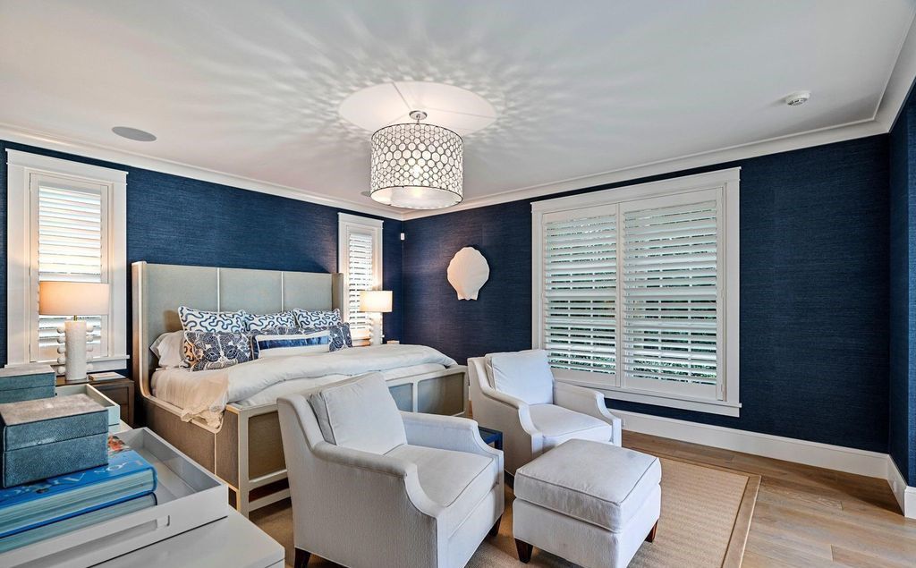 Indulge in luxurious coastal living at 156 Seagate, a meticulously designed haven nestled on Palm Beach Island's coveted North End.