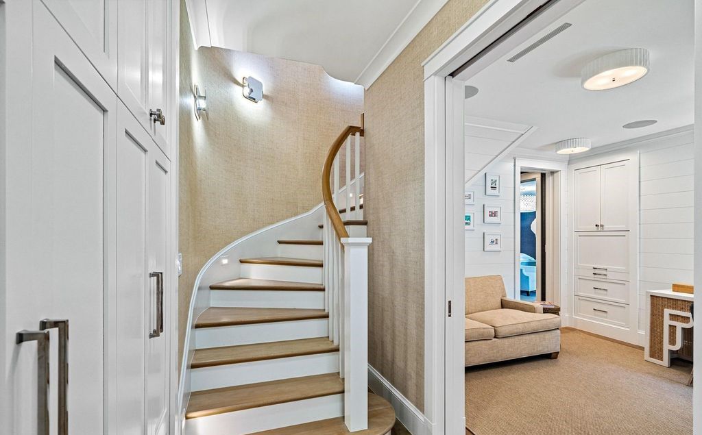 Indulge in luxurious coastal living at 156 Seagate, a meticulously designed haven nestled on Palm Beach Island's coveted North End.