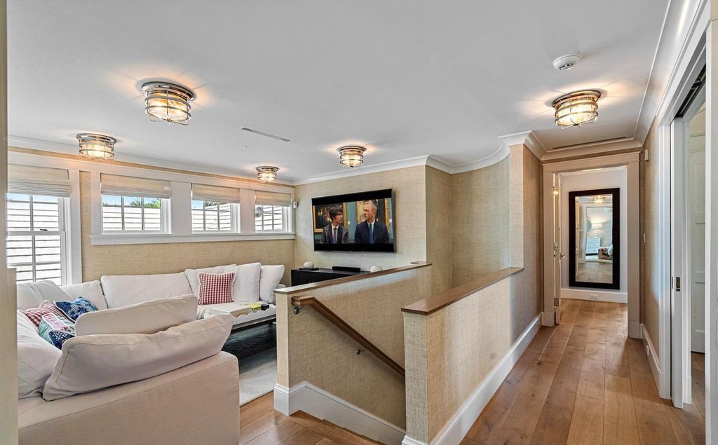 Indulge in luxurious coastal living at 156 Seagate, a meticulously designed haven nestled on Palm Beach Island's coveted North End.