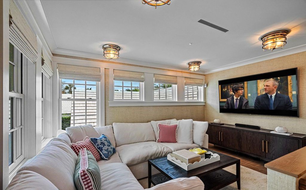 Indulge in luxurious coastal living at 156 Seagate, a meticulously designed haven nestled on Palm Beach Island's coveted North End.