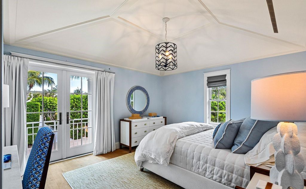 Indulge in luxurious coastal living at 156 Seagate, a meticulously designed haven nestled on Palm Beach Island's coveted North End.