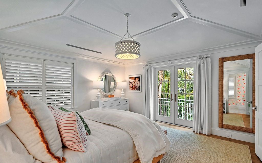 Indulge in luxurious coastal living at 156 Seagate, a meticulously designed haven nestled on Palm Beach Island's coveted North End.