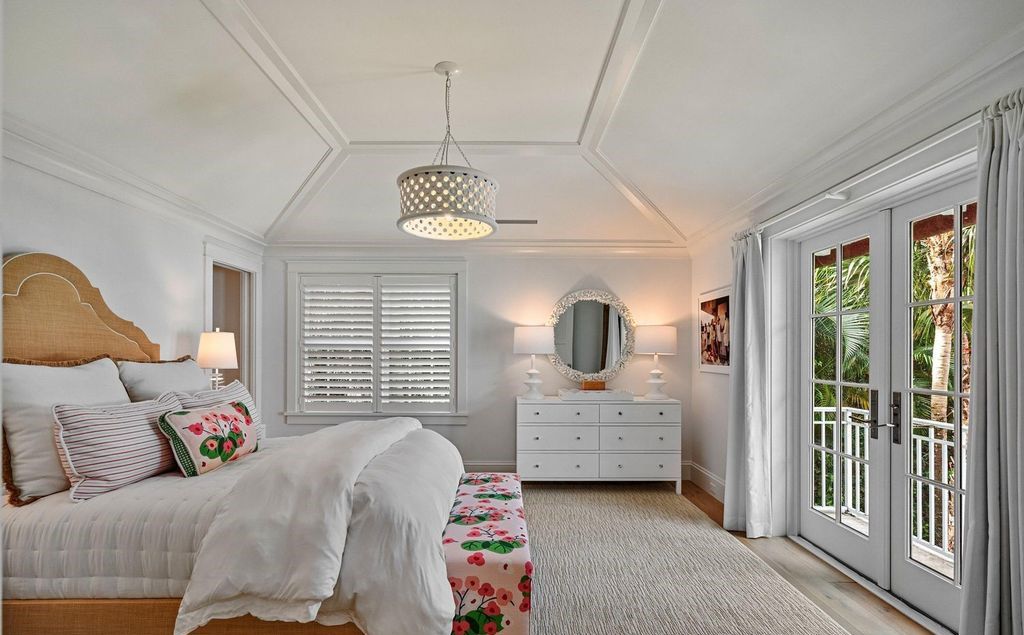 Indulge in luxurious coastal living at 156 Seagate, a meticulously designed haven nestled on Palm Beach Island's coveted North End.