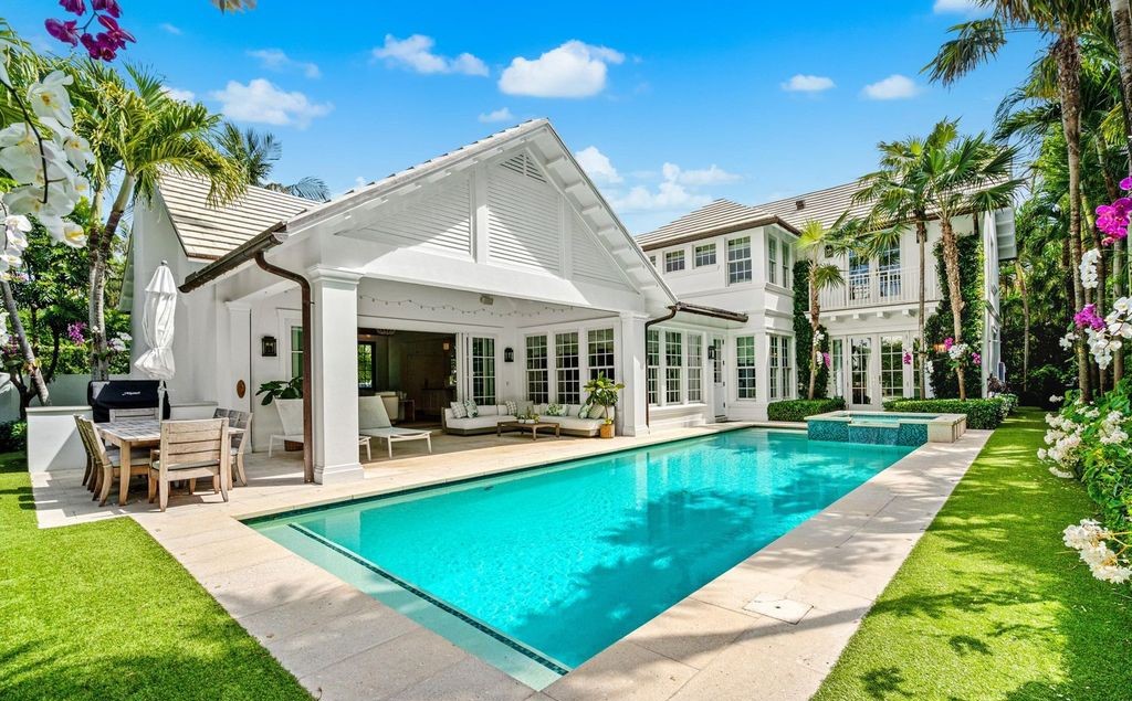 Indulge in luxurious coastal living at 156 Seagate, a meticulously designed haven nestled on Palm Beach Island's coveted North End.