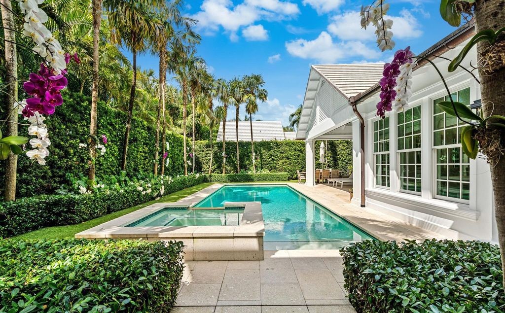 Indulge in luxurious coastal living at 156 Seagate, a meticulously designed haven nestled on Palm Beach Island's coveted North End.