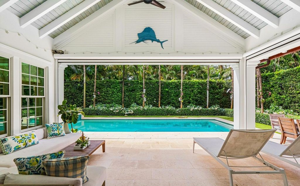 Indulge in luxurious coastal living at 156 Seagate, a meticulously designed haven nestled on Palm Beach Island's coveted North End.
