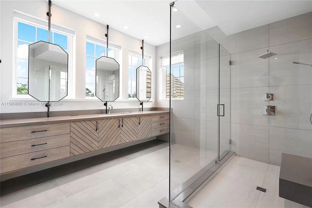 Indulge in the pinnacle of luxury with this custom French Country style mansion in Southwest Ranches, boasting over 15,000 square feet of meticulously crafted living space.