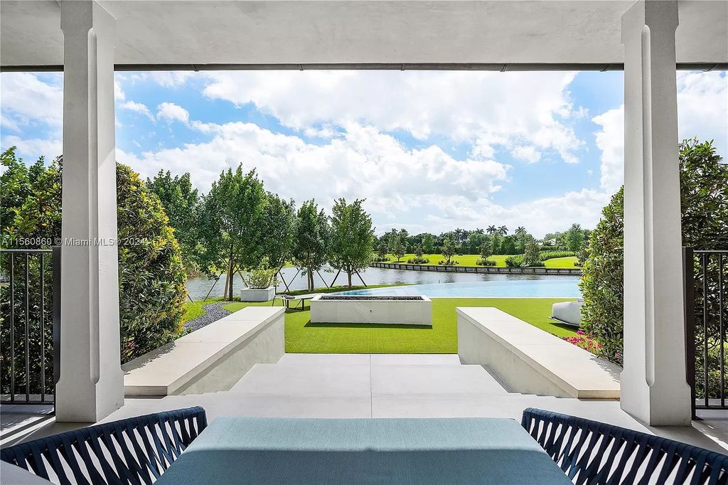 Indulge in the pinnacle of luxury with this custom French Country style mansion in Southwest Ranches, boasting over 15,000 square feet of meticulously crafted living space.