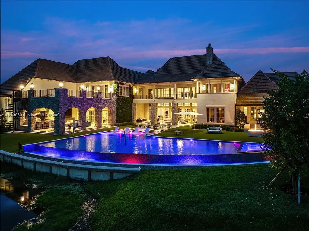 Indulge in the pinnacle of luxury with this custom French Country style mansion in Southwest Ranches, boasting over 15,000 square feet of meticulously crafted living space.
