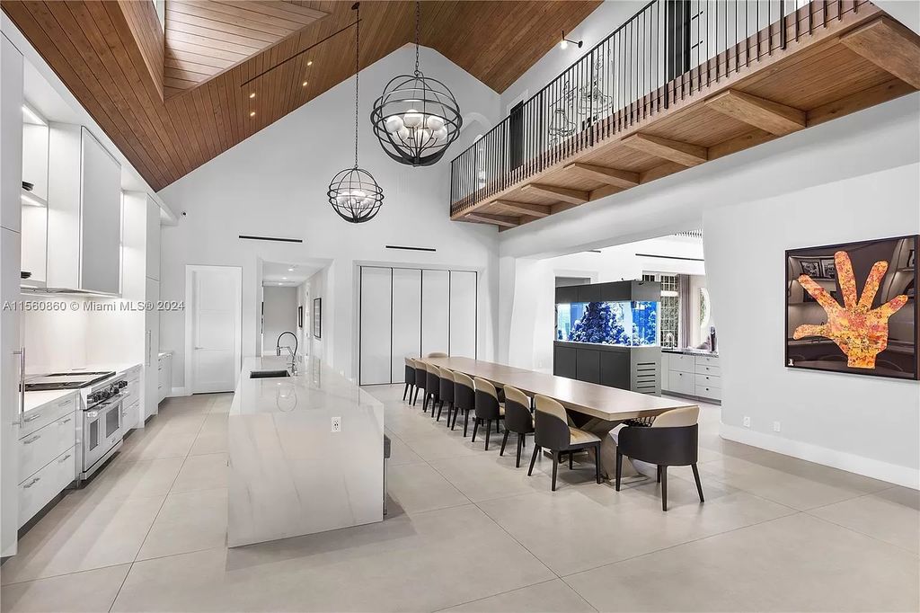 Indulge in the pinnacle of luxury with this custom French Country style mansion in Southwest Ranches, boasting over 15,000 square feet of meticulously crafted living space.