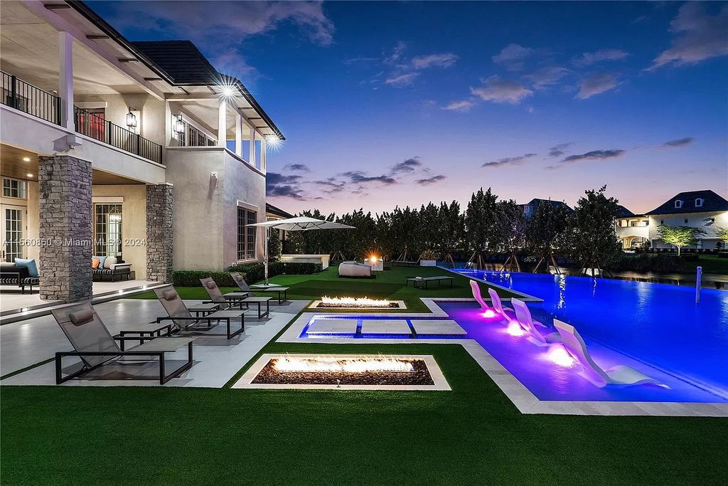 Indulge in the pinnacle of luxury with this custom French Country style mansion in Southwest Ranches, boasting over 15,000 square feet of meticulously crafted living space.