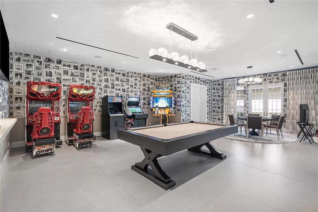 Indulge in the pinnacle of luxury with this custom French Country style mansion in Southwest Ranches, boasting over 15,000 square feet of meticulously crafted living space.