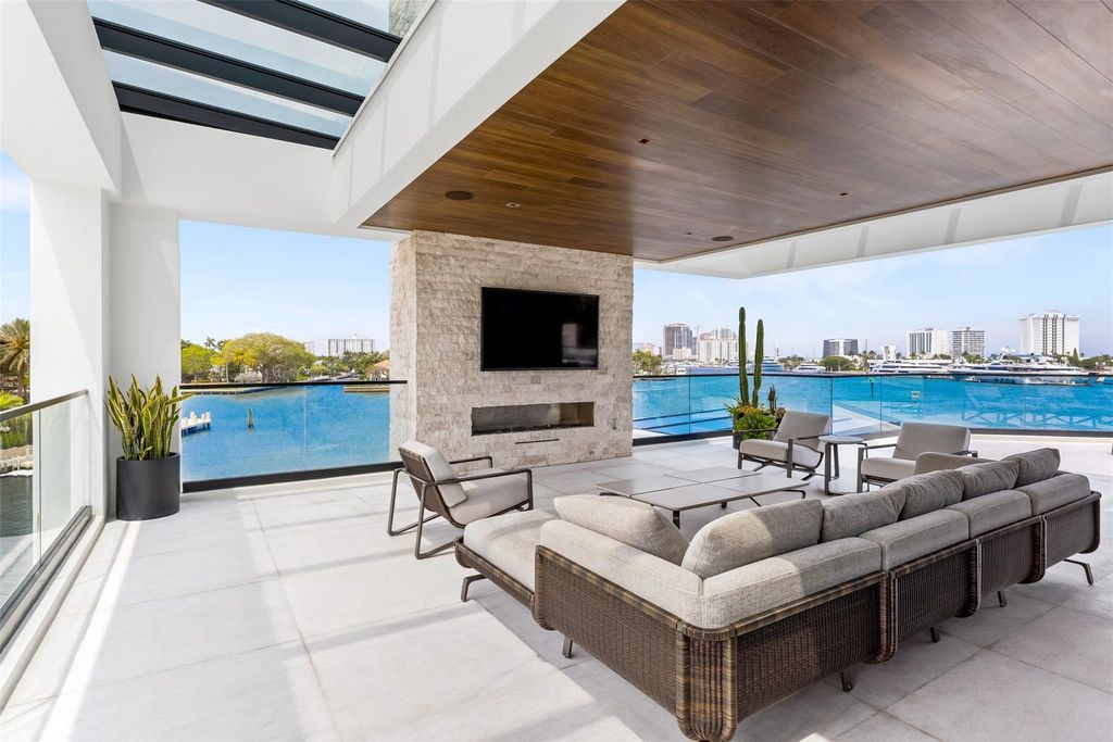 Experience the epitome of luxury living in Fort Lauderdale's prestigious Harbor Beach enclave with this exquisite estate boasting stunning Intracoastal views and 298 feet of water frontage.