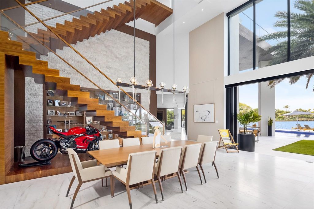 Experience the epitome of luxury living in Fort Lauderdale's prestigious Harbor Beach enclave with this exquisite estate boasting stunning Intracoastal views and 298 feet of water frontage.