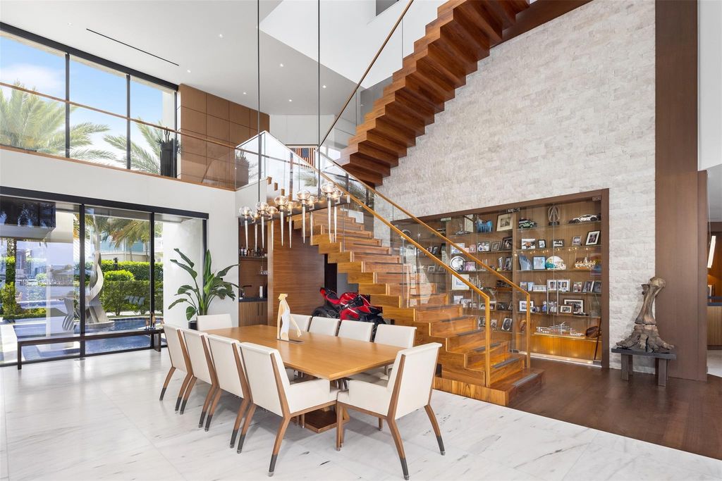 Experience the epitome of luxury living in Fort Lauderdale's prestigious Harbor Beach enclave with this exquisite estate boasting stunning Intracoastal views and 298 feet of water frontage.