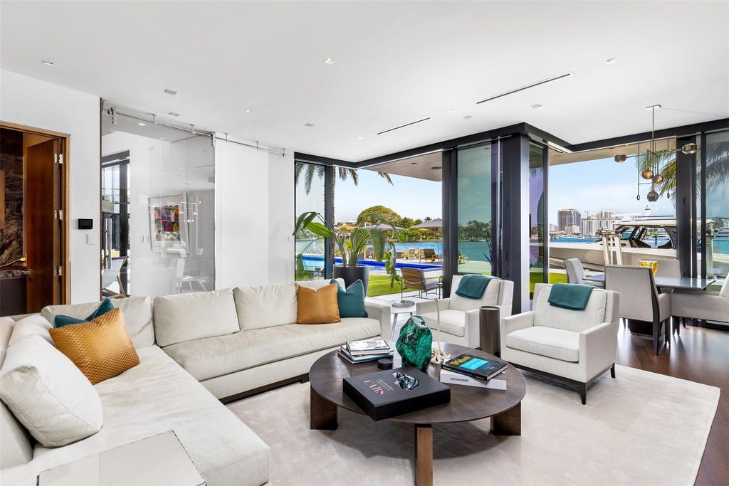 Experience the epitome of luxury living in Fort Lauderdale's prestigious Harbor Beach enclave with this exquisite estate boasting stunning Intracoastal views and 298 feet of water frontage.