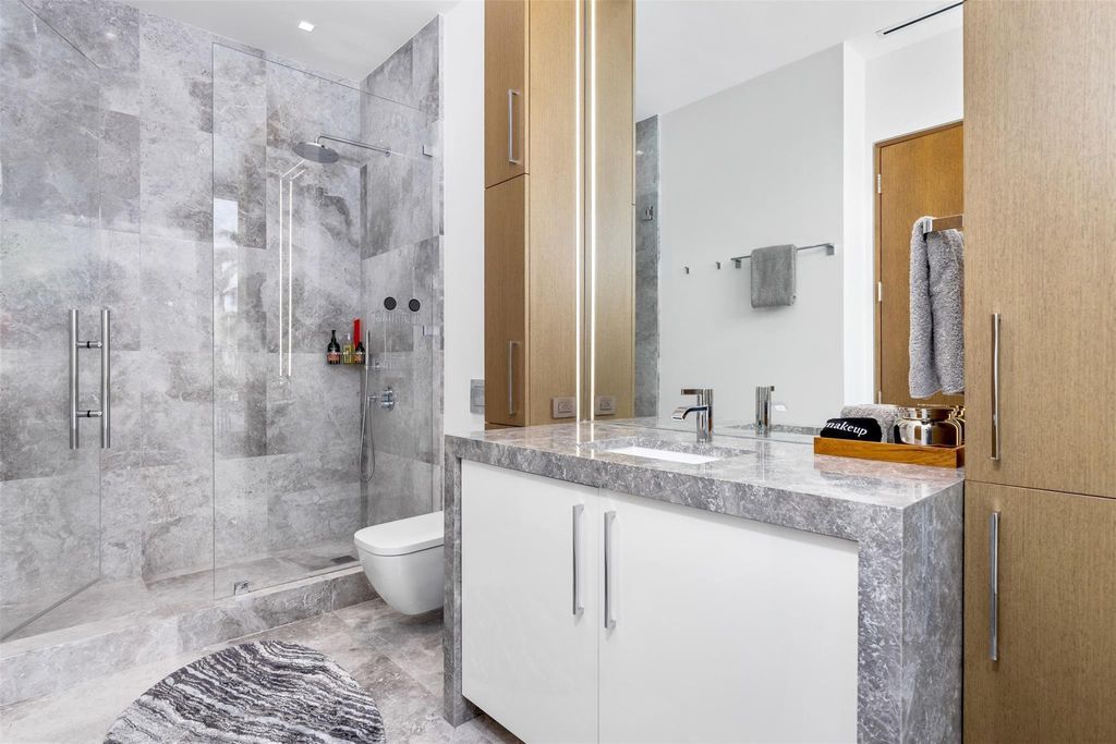 Experience the epitome of luxury living in Fort Lauderdale's prestigious Harbor Beach enclave with this exquisite estate boasting stunning Intracoastal views and 298 feet of water frontage.