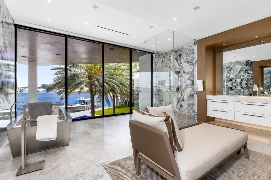 Experience the epitome of luxury living in Fort Lauderdale's prestigious Harbor Beach enclave with this exquisite estate boasting stunning Intracoastal views and 298 feet of water frontage.