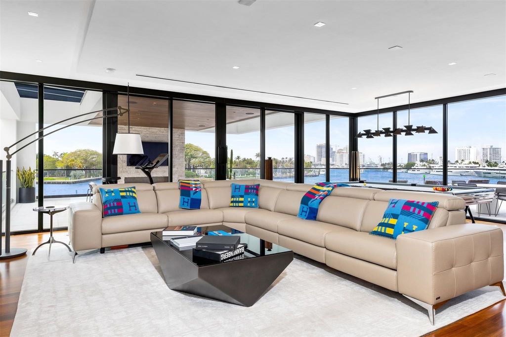 Experience the epitome of luxury living in Fort Lauderdale's prestigious Harbor Beach enclave with this exquisite estate boasting stunning Intracoastal views and 298 feet of water frontage.