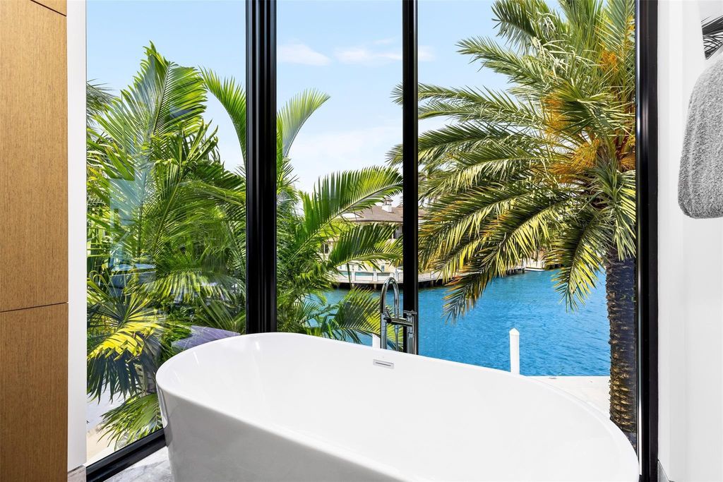 Experience the epitome of luxury living in Fort Lauderdale's prestigious Harbor Beach enclave with this exquisite estate boasting stunning Intracoastal views and 298 feet of water frontage.