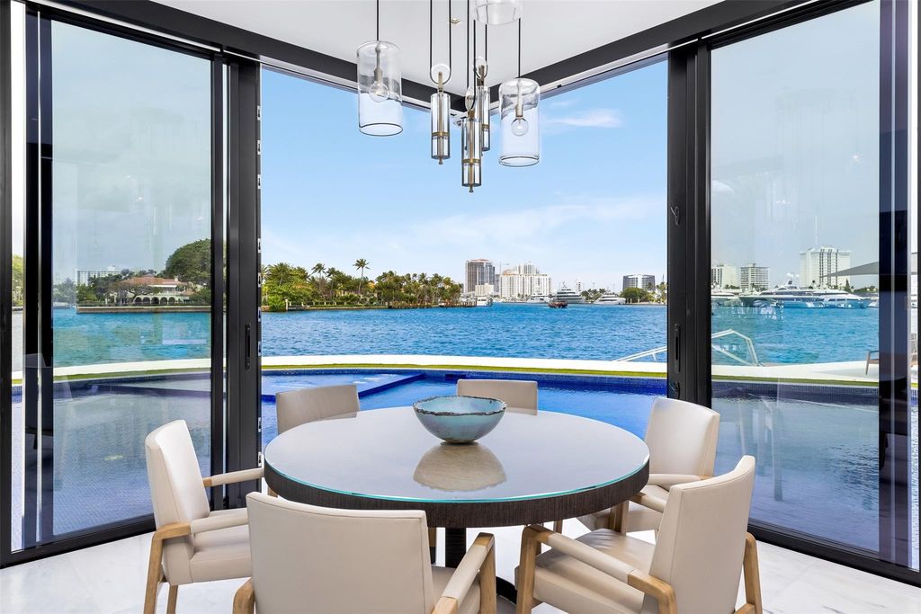 Experience the epitome of luxury living in Fort Lauderdale's prestigious Harbor Beach enclave with this exquisite estate boasting stunning Intracoastal views and 298 feet of water frontage.