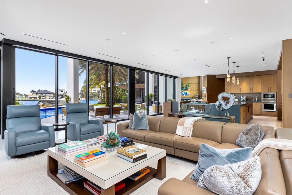 Experience the epitome of luxury living in Fort Lauderdale's prestigious Harbor Beach enclave with this exquisite estate boasting stunning Intracoastal views and 298 feet of water frontage.