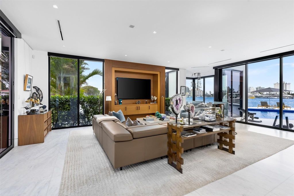 Experience the epitome of luxury living in Fort Lauderdale's prestigious Harbor Beach enclave with this exquisite estate boasting stunning Intracoastal views and 298 feet of water frontage.