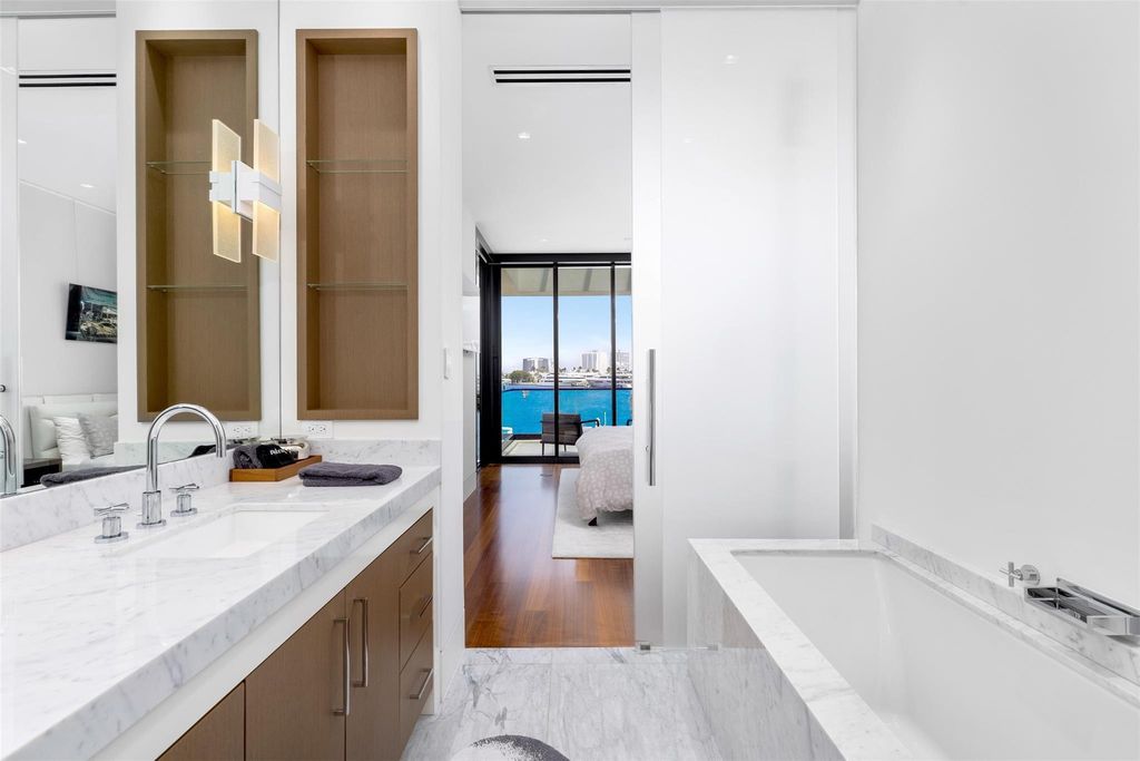 Experience the epitome of luxury living in Fort Lauderdale's prestigious Harbor Beach enclave with this exquisite estate boasting stunning Intracoastal views and 298 feet of water frontage.