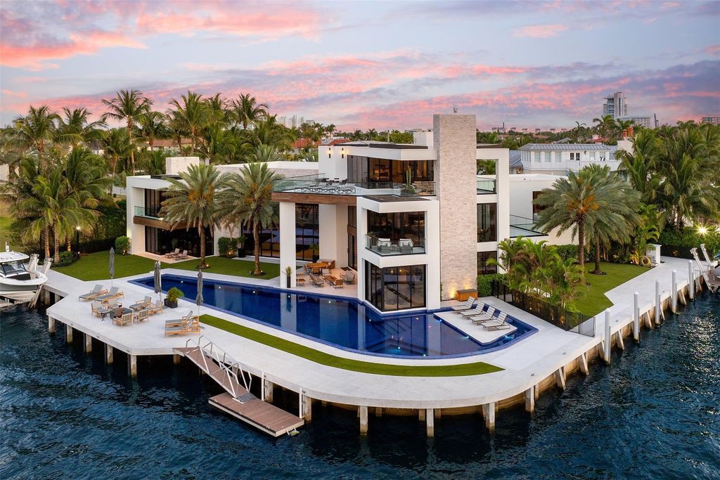 Experience the epitome of luxury living in Fort Lauderdale's prestigious Harbor Beach enclave with this exquisite estate boasting stunning Intracoastal views and 298 feet of water frontage.