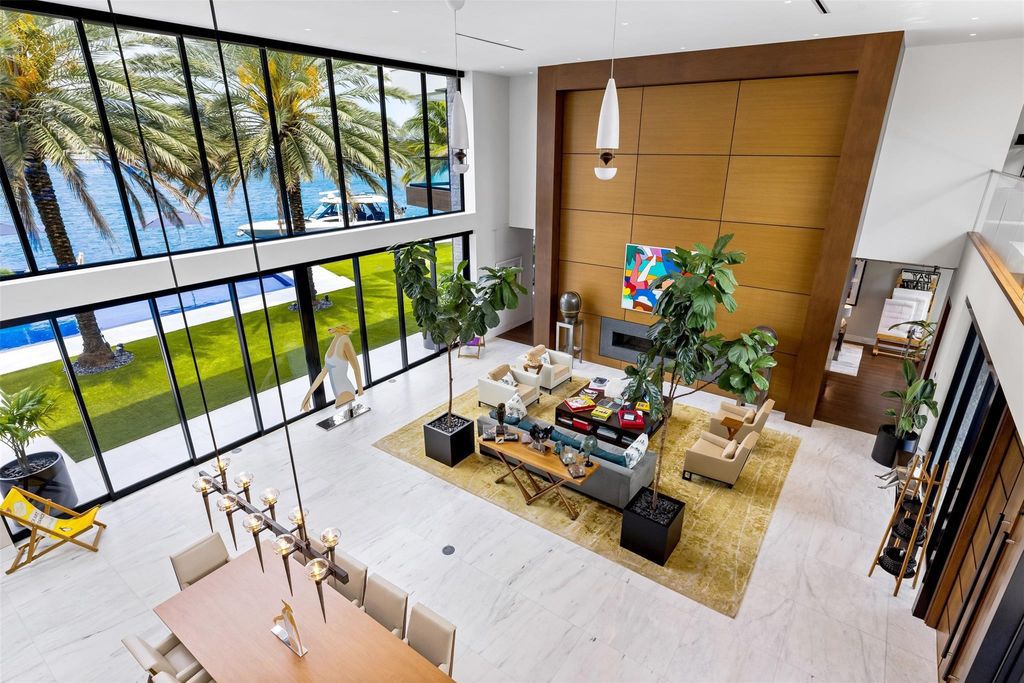 Experience the epitome of luxury living in Fort Lauderdale's prestigious Harbor Beach enclave with this exquisite estate boasting stunning Intracoastal views and 298 feet of water frontage.