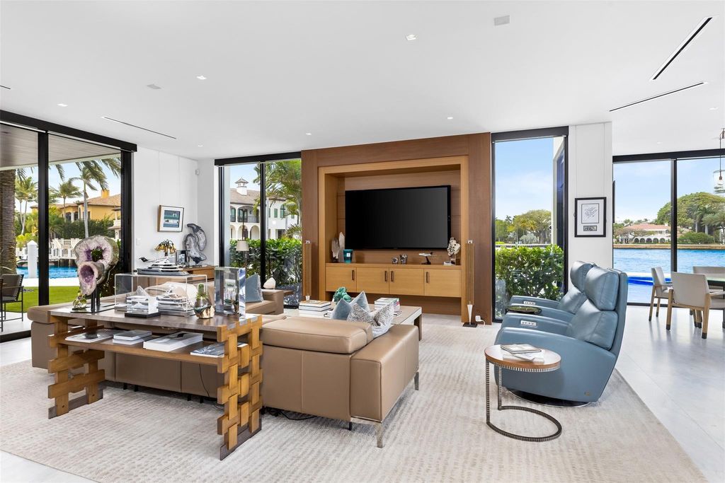 Experience the epitome of luxury living in Fort Lauderdale's prestigious Harbor Beach enclave with this exquisite estate boasting stunning Intracoastal views and 298 feet of water frontage.