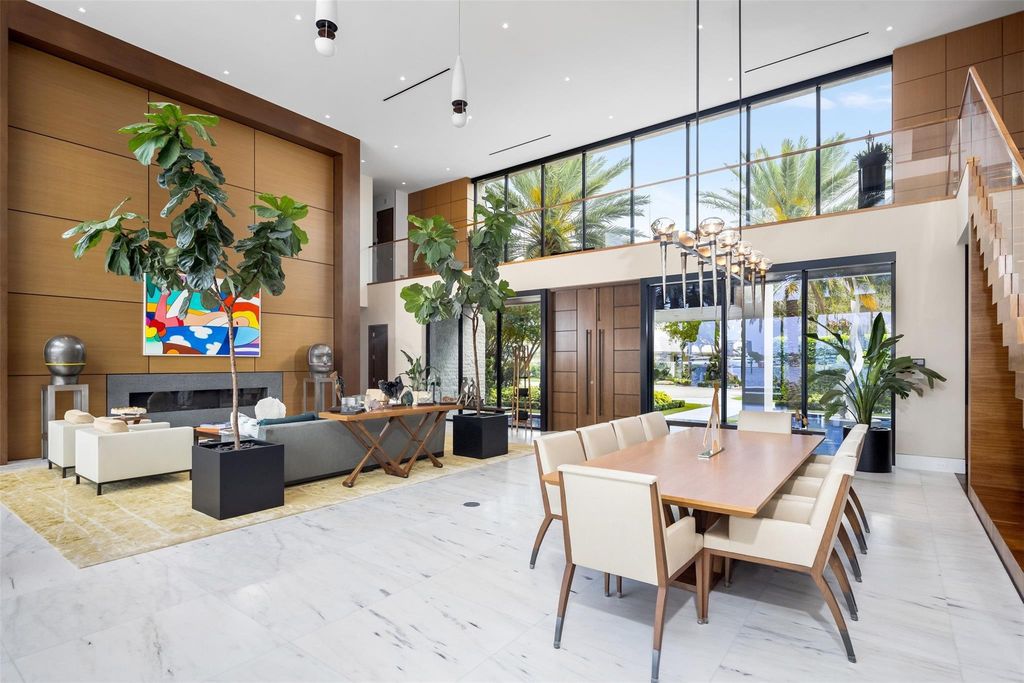 Experience the epitome of luxury living in Fort Lauderdale's prestigious Harbor Beach enclave with this exquisite estate boasting stunning Intracoastal views and 298 feet of water frontage.