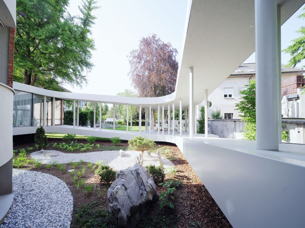Ring House, Interwar Classic to Oasis by OFIS Architects