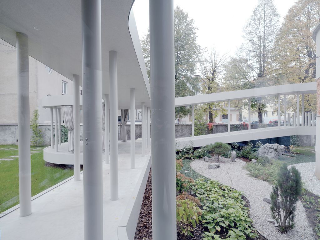 Ring House, Interwar Classic to Oasis by OFIS Architects