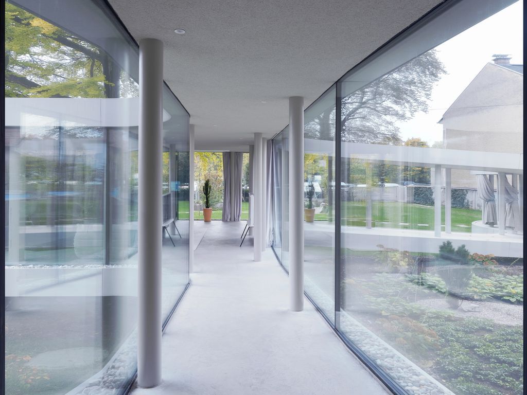Ring House Interwar Classic to Oasis by OFIS Architects 7
