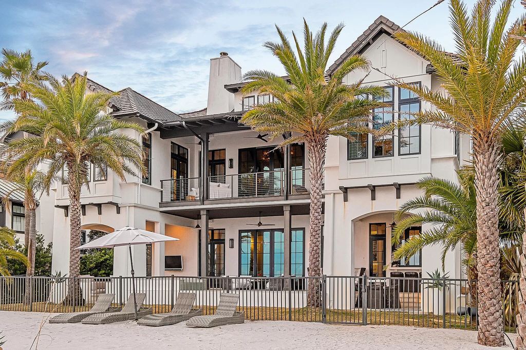 This meticulously crafted masterpiece boasts a seamless blend of indoor and outdoor spaces, offering unparalleled views of the azure waters.