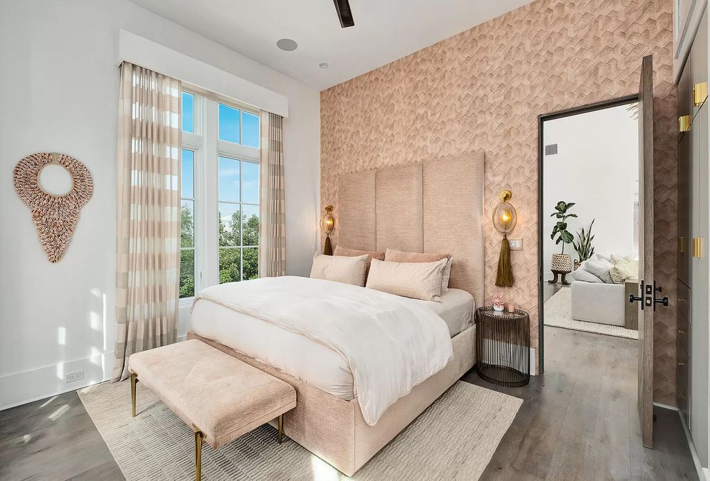 This meticulously crafted masterpiece boasts a seamless blend of indoor and outdoor spaces, offering unparalleled views of the azure waters.