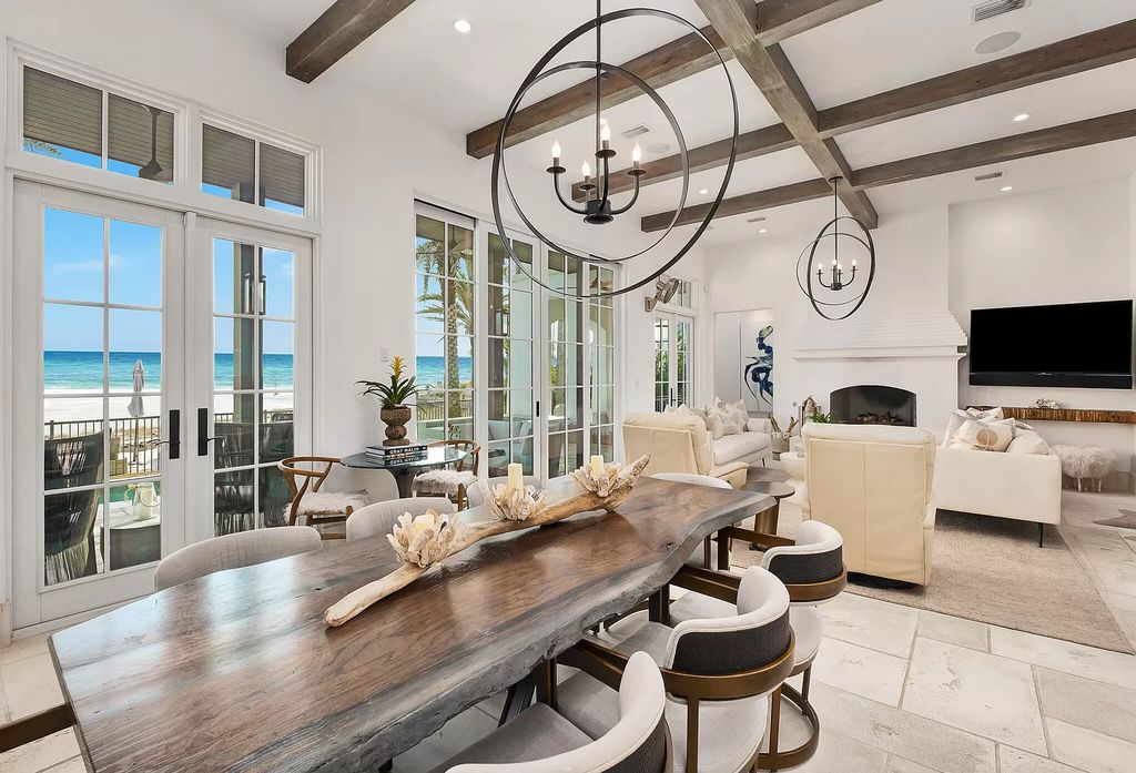 This meticulously crafted masterpiece boasts a seamless blend of indoor and outdoor spaces, offering unparalleled views of the azure waters.