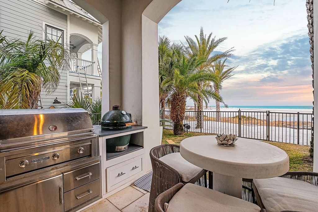 This meticulously crafted masterpiece boasts a seamless blend of indoor and outdoor spaces, offering unparalleled views of the azure waters.
