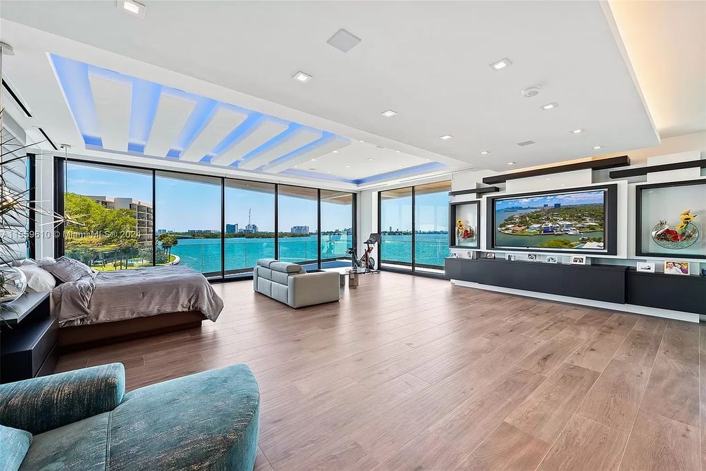 Welcome to 1133 Belle Meade Island Dr, a breathtaking Bay/Canal Contemporary Residence in the heart of Miami. This New Construction marvel boasts 100+ ft on deep water, showcasing Travertine exterior walls and ultra-luxury finishes throughout its 12,200 SF under A/C.
