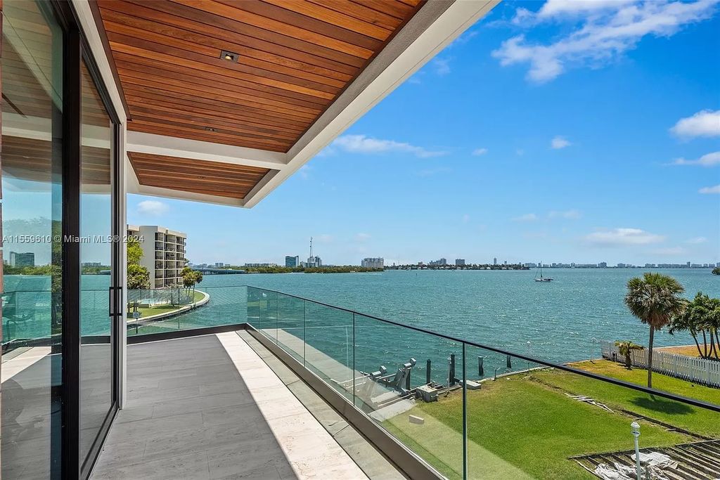 Welcome to 1133 Belle Meade Island Dr, a breathtaking Bay/Canal Contemporary Residence in the heart of Miami. This New Construction marvel boasts 100+ ft on deep water, showcasing Travertine exterior walls and ultra-luxury finishes throughout its 12,200 SF under A/C.