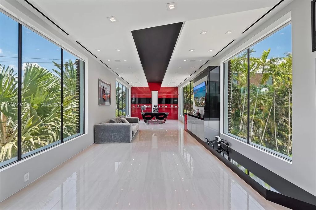 Welcome to 1133 Belle Meade Island Dr, a breathtaking Bay/Canal Contemporary Residence in the heart of Miami. This New Construction marvel boasts 100+ ft on deep water, showcasing Travertine exterior walls and ultra-luxury finishes throughout its 12,200 SF under A/C.