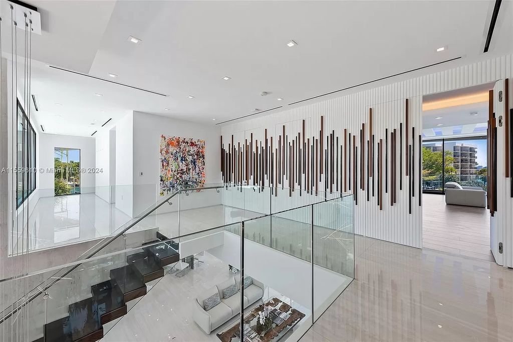 Welcome to 1133 Belle Meade Island Dr, a breathtaking Bay/Canal Contemporary Residence in the heart of Miami. This New Construction marvel boasts 100+ ft on deep water, showcasing Travertine exterior walls and ultra-luxury finishes throughout its 12,200 SF under A/C.