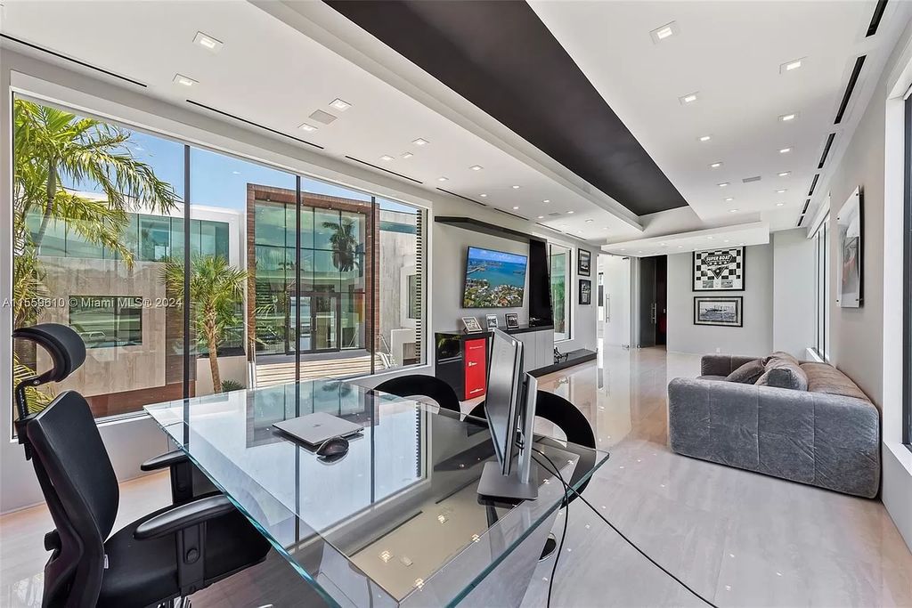 Welcome to 1133 Belle Meade Island Dr, a breathtaking Bay/Canal Contemporary Residence in the heart of Miami. This New Construction marvel boasts 100+ ft on deep water, showcasing Travertine exterior walls and ultra-luxury finishes throughout its 12,200 SF under A/C.