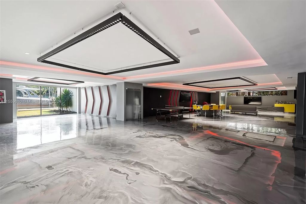 Welcome to 1133 Belle Meade Island Dr, a breathtaking Bay/Canal Contemporary Residence in the heart of Miami. This New Construction marvel boasts 100+ ft on deep water, showcasing Travertine exterior walls and ultra-luxury finishes throughout its 12,200 SF under A/C.