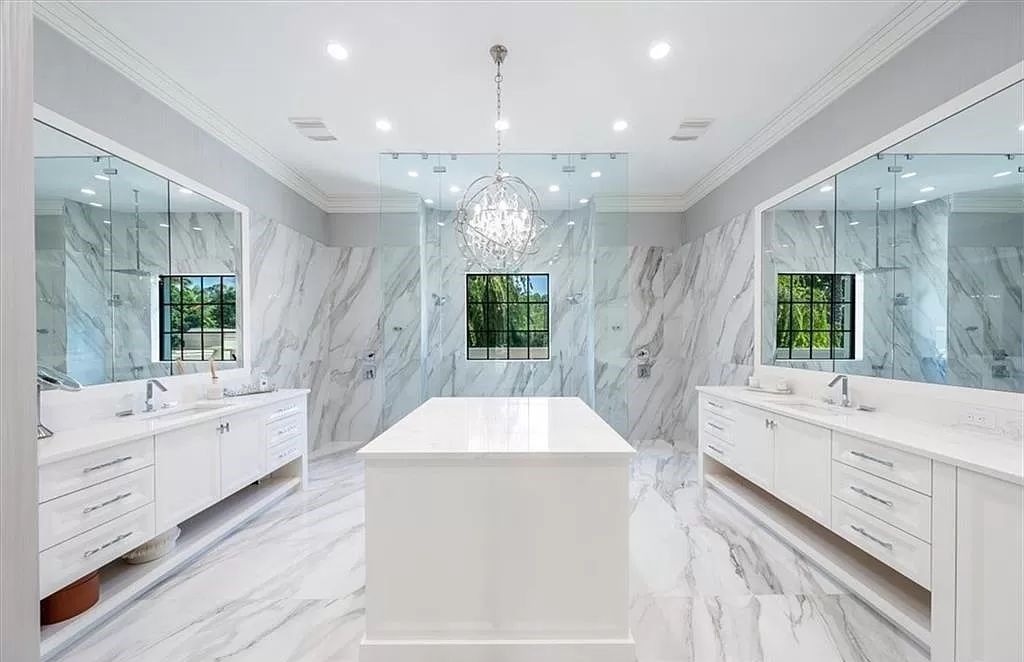 Welcome to 6536 Highcroft Drive in Quail West, Naples, Florida - a home where luxury meets comfort in every detail.