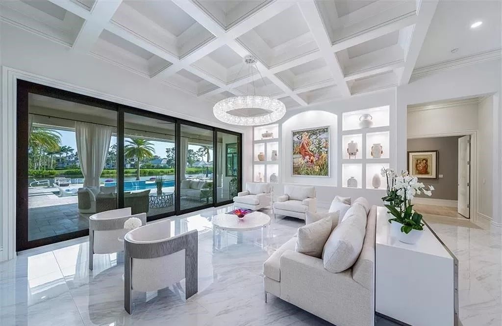 Welcome to 6536 Highcroft Drive in Quail West, Naples, Florida - a home where luxury meets comfort in every detail.
