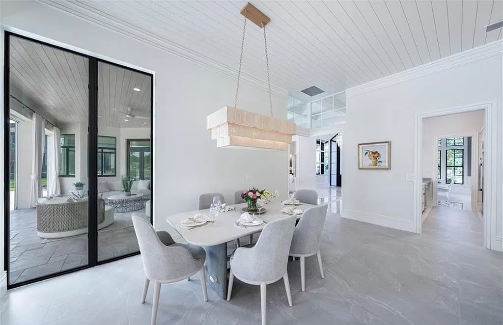 Welcome to 6536 Highcroft Drive in Quail West, Naples, Florida - a home where luxury meets comfort in every detail.